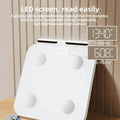 White professional body fat scale with 8 electrodes and tempered glass platform