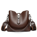 Textured PU bucket bag in black with patchwork stitching, horizontal rectangular shape, single shoulder strap.