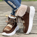 Beige women's lace-up suede snow boots with thermal lining and a thick rubber sole.