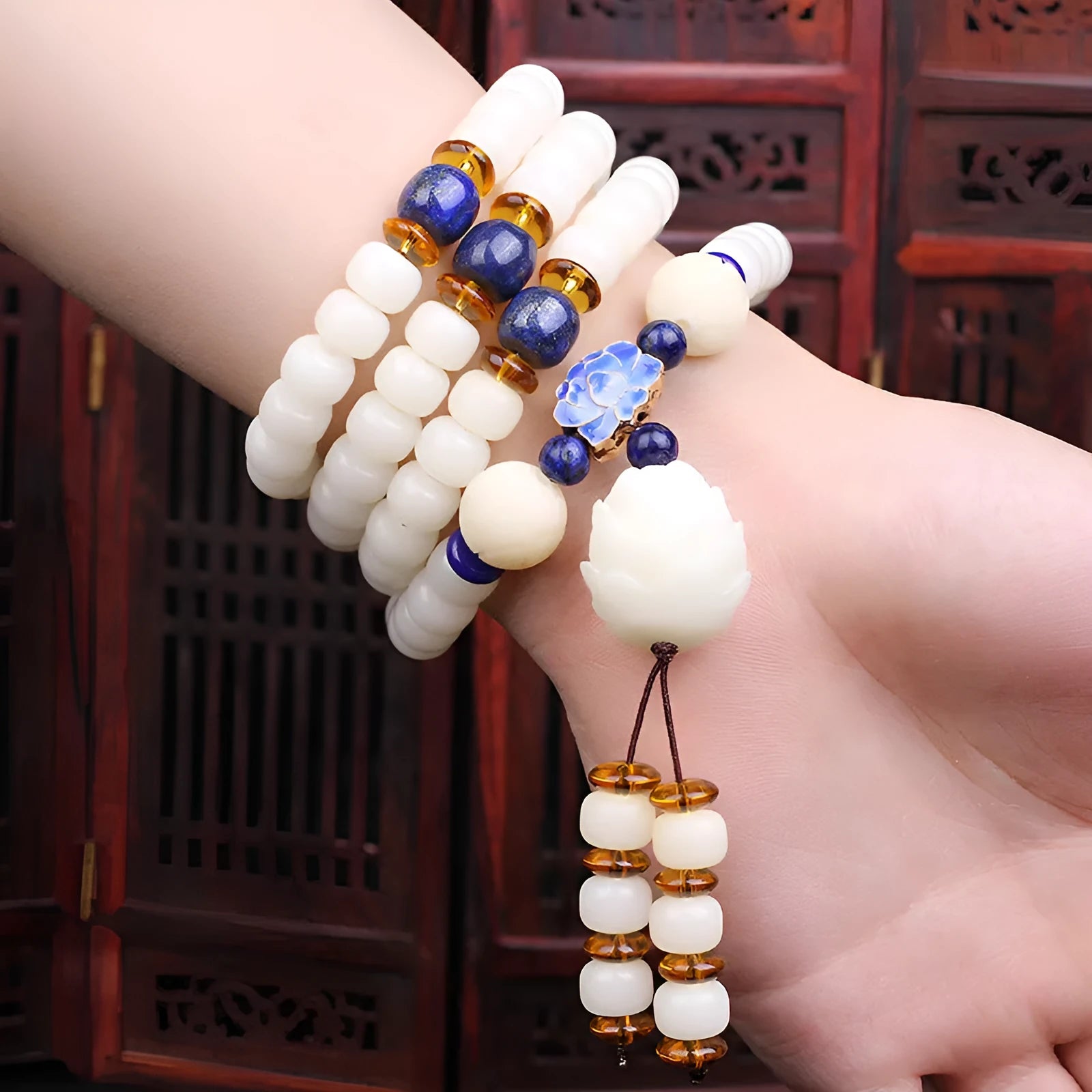 White jade bodhi beads long bracelet with 6x8mm beads in a decorative style