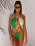 Women's solid green hollow one-piece polyester swimsuit in size S M L
