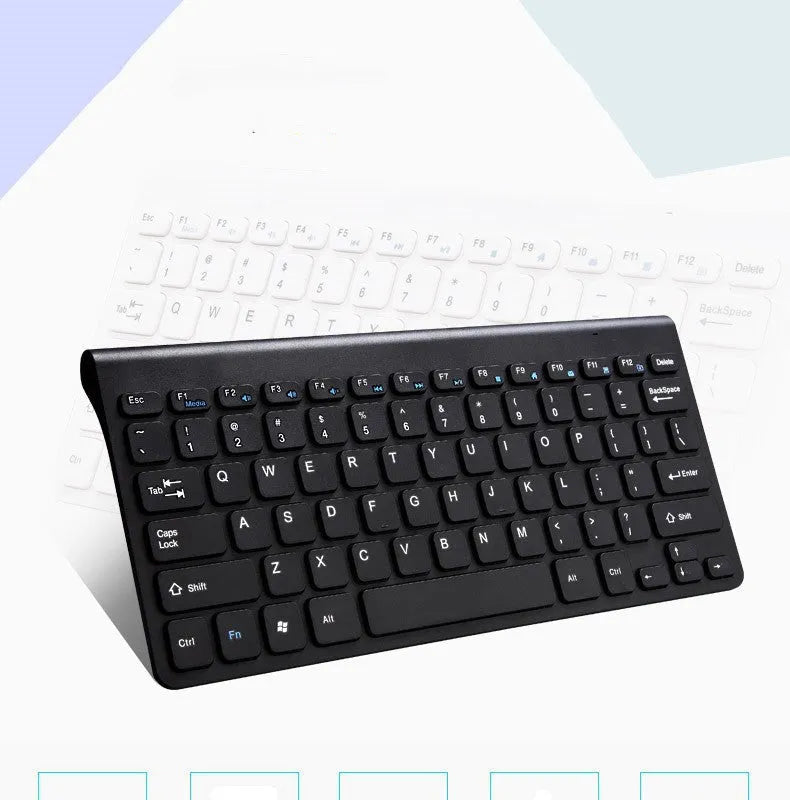Black and white wireless keyboard and mouse set with UK layout and USB receiver