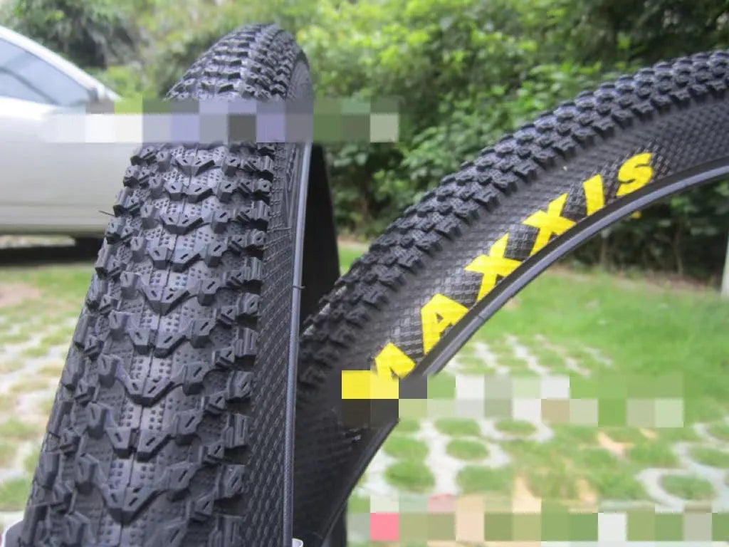 Mountain bike ultralight puncture proof tyre showing tread pattern, available in multiple wheel sizes.