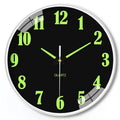 20cm diameter luminous wall clock with modern plastic shell on white wall