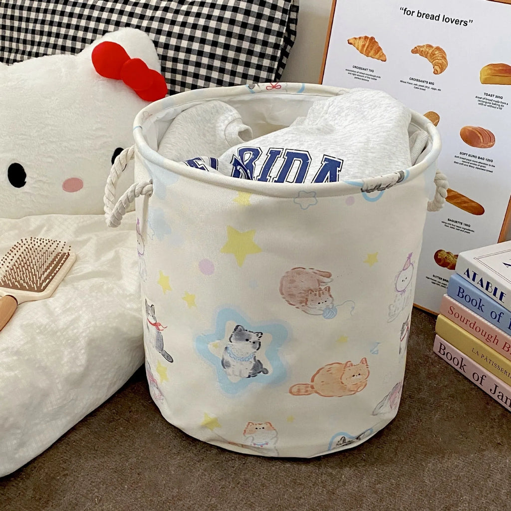 Foldable cotton laundry basket in a choice of twelve patterns including baby bear and mint green designs