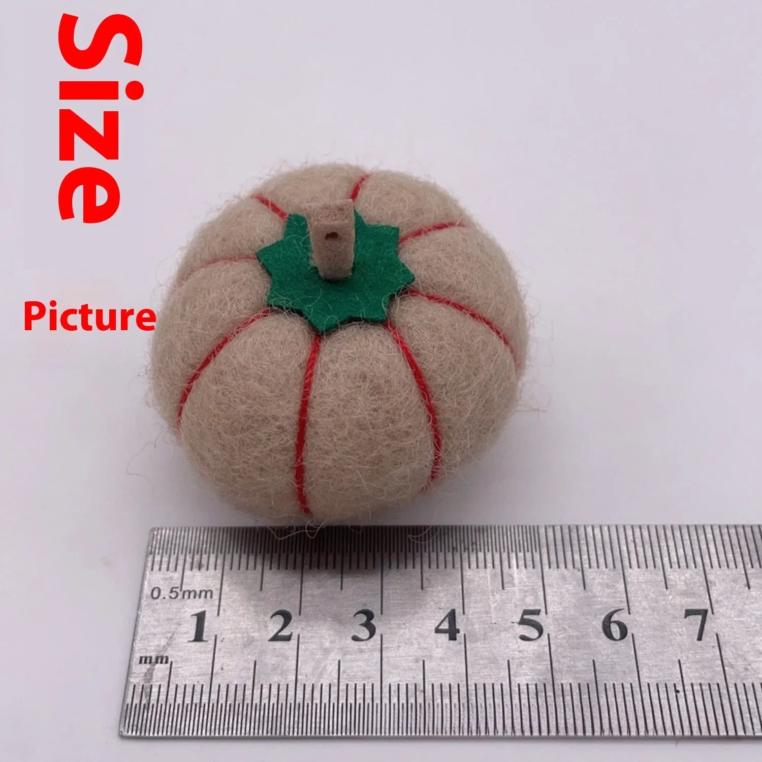 Wool felt pumpkin poke ornament in orange, approximately 5cm diameter and 4.5cm height, for doll decoration