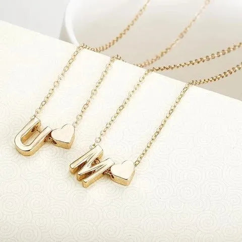 Peach heart shaped letter pendant necklace in gold and silver alloy jewellery