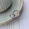 Adjustable vintage copper ring with white chalcedony design and antique finish