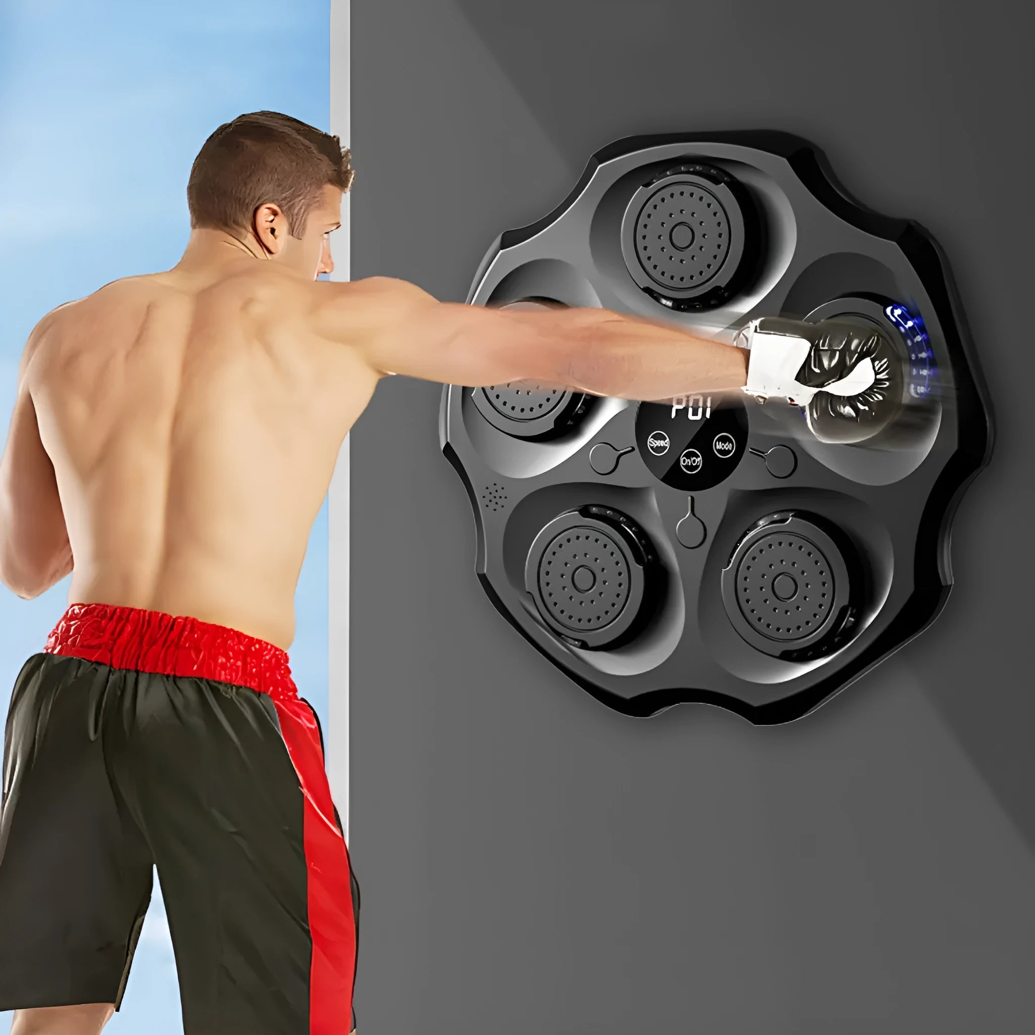 Black Bluetooth music boxing wall target with hanging mount and included adult boxing glove