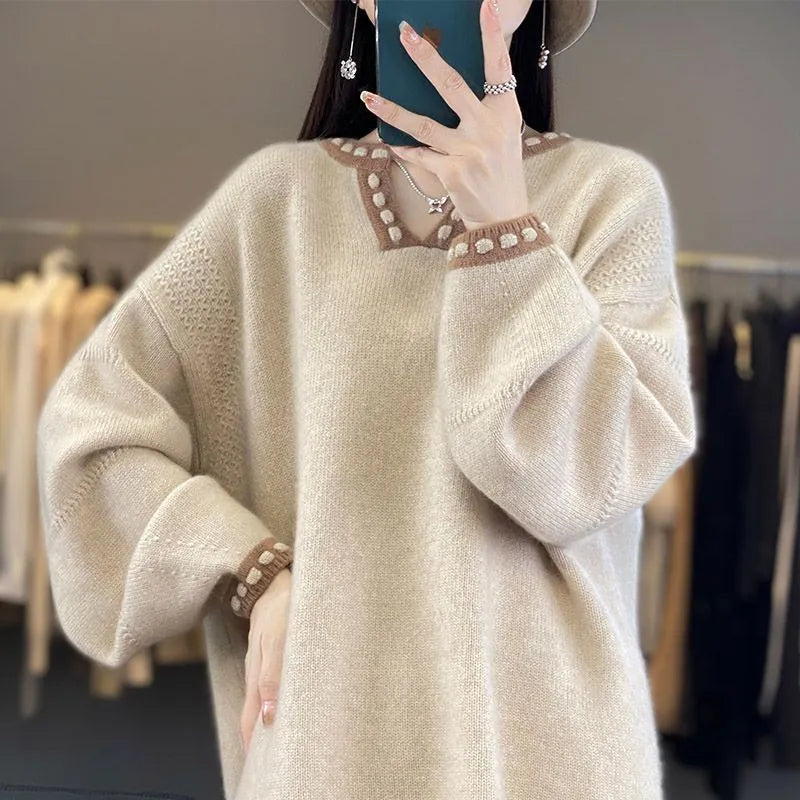 Women's white V-neck viscose sweater with regular long sleeves on mannequin