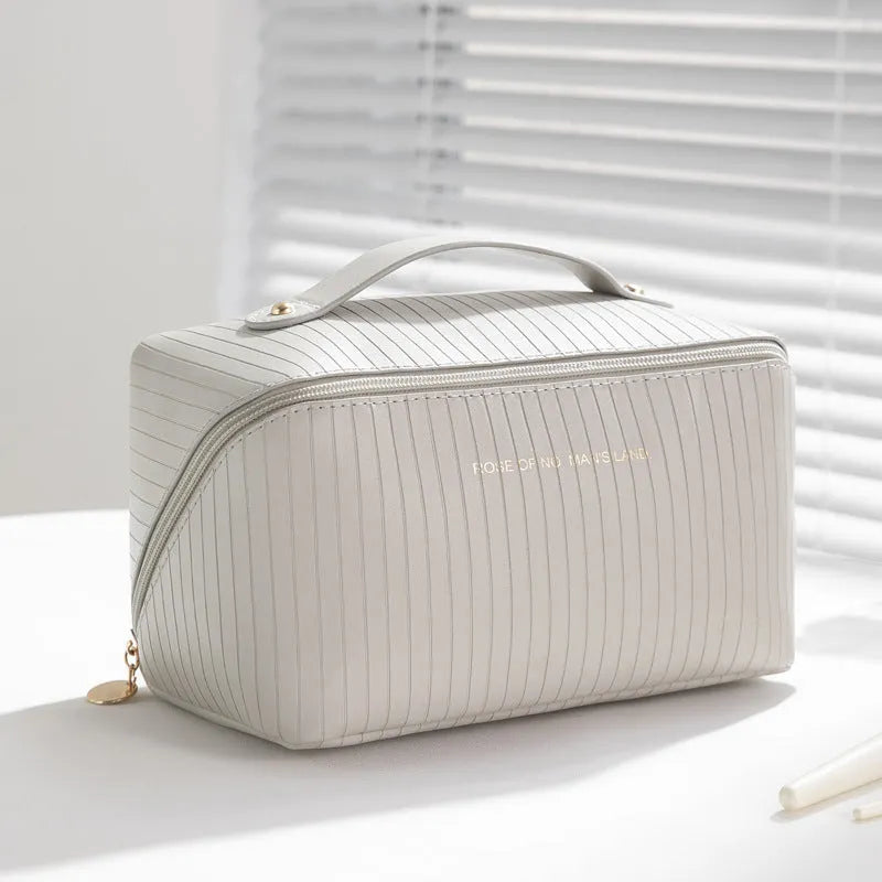 Vertical pattern pillow makeup bag in cubic shape with dimensions 22.5cm x 12.5cm x 12.5cm