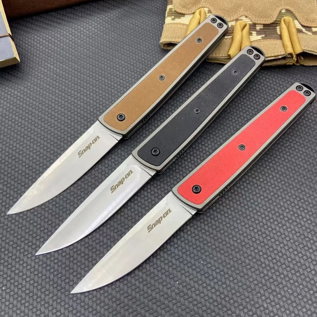 CRKT 7190 folding fruit knife showing blade and handle in choice of black, coffee brown, or red colours