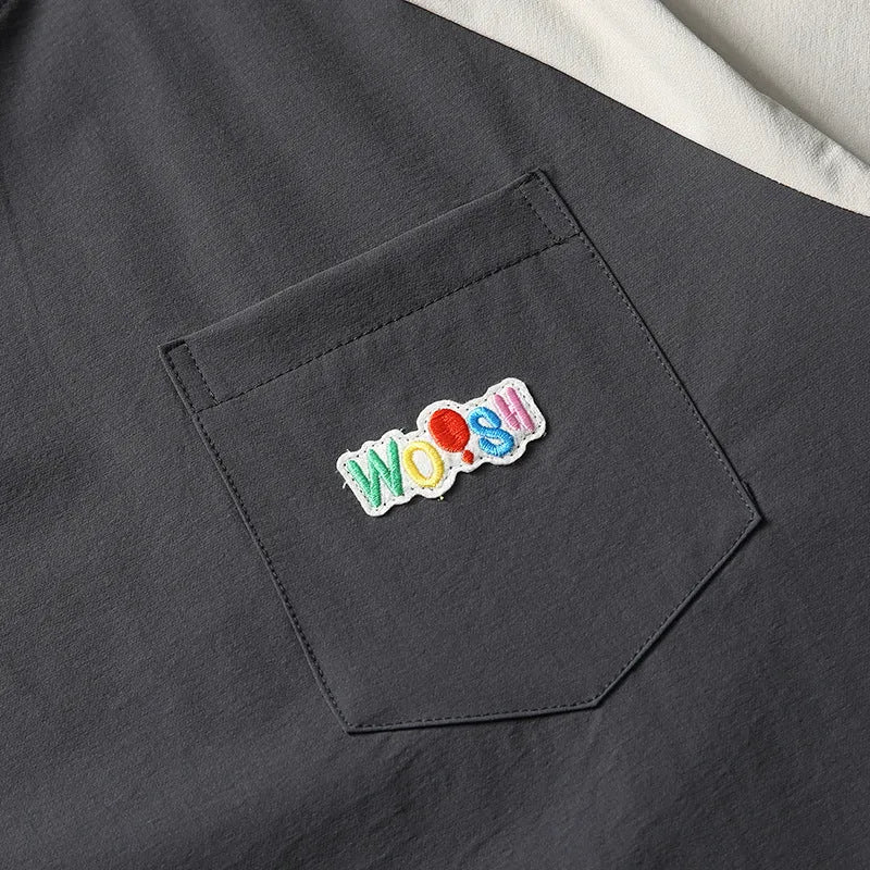 Dark grey men's t-shirt with contrast colour raglan sleeves and loose fit