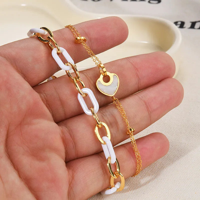 Women's stainless steel resin bracelet with double-layered loving heart design