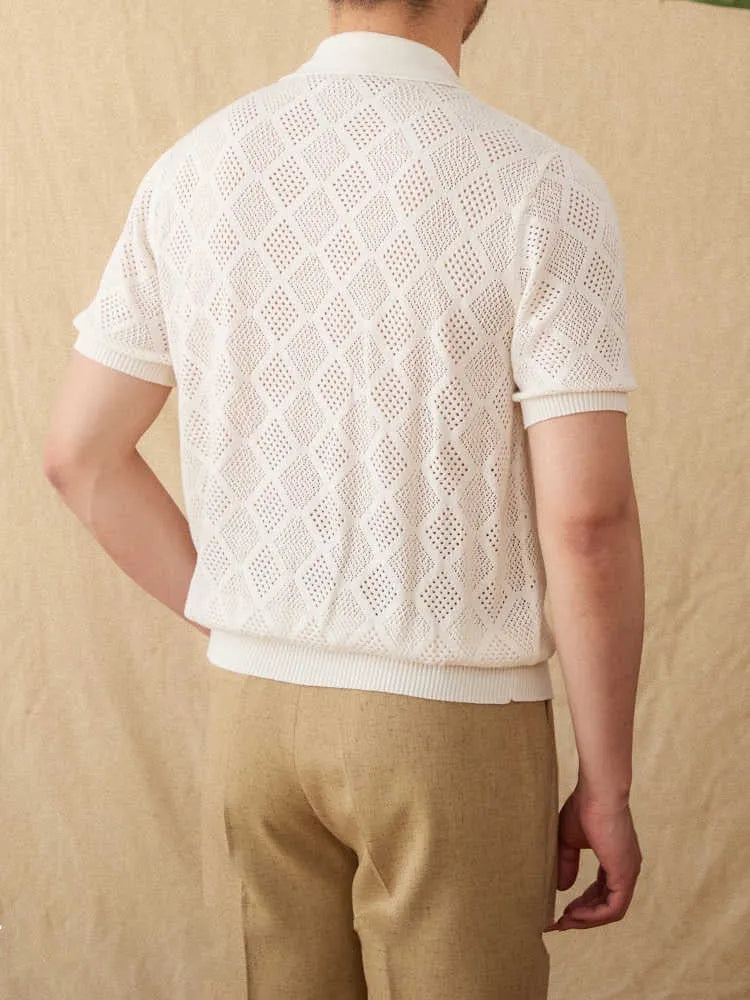 Light brown cotton cardigan with front zip and lapel collar on a hanger