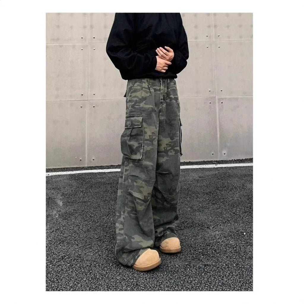 Korean-style washed camouflage cargo pants with multiple pockets on a mid-waist fit.