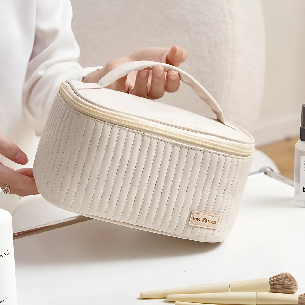 Open-top cake style makeup bag in PU leather, shown in one of six solid colours