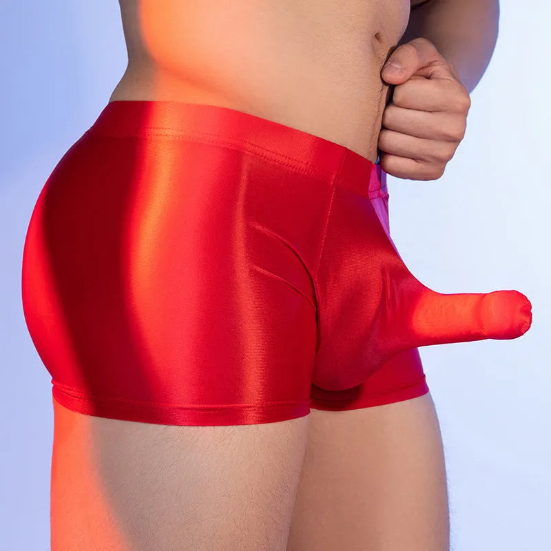 Red men's boxer shorts with an elephant nose pattern, made from seamless Nylon fabric.