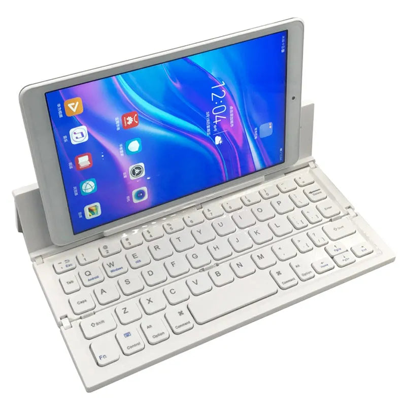 Mini folding ultra-thin wireless Bluetooth keyboard in black, open and ready for typing with a tablet