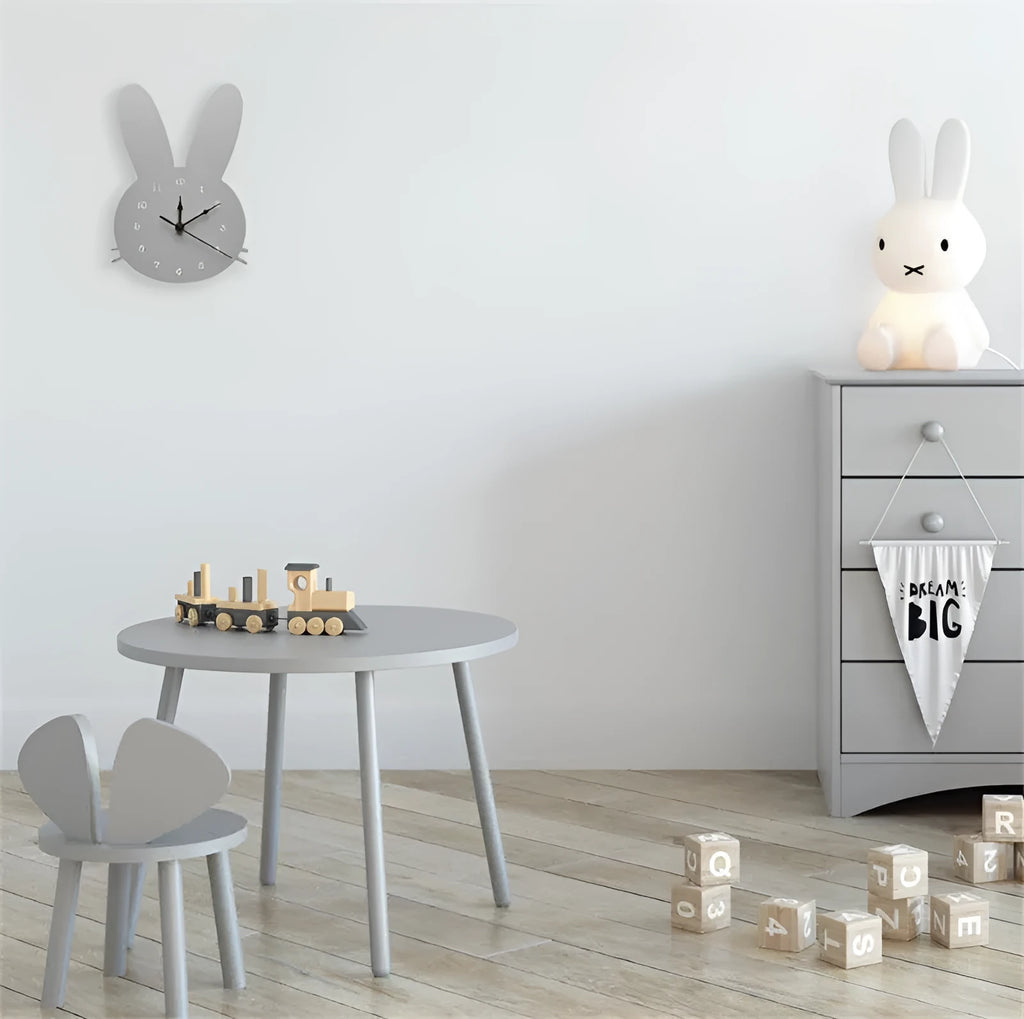 Wooden cartoon wall clock with playful design, battery operated, showing character shapes on clock face