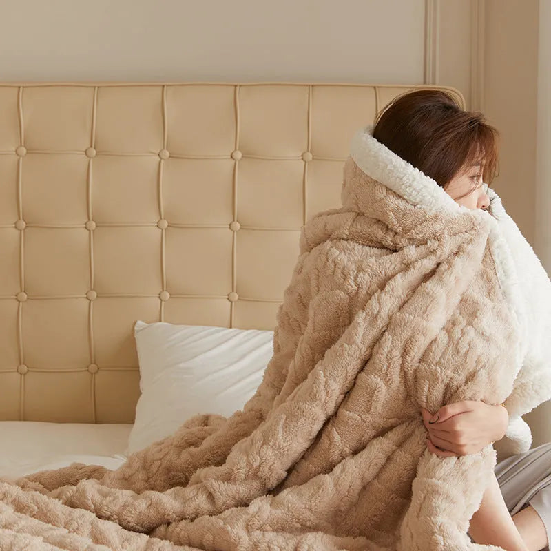 180x200cm thermal polyester blanket in tea green colour on a bed