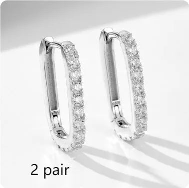 S925 sterling silver oval zircon earrings with ear clip fastening in geometric design