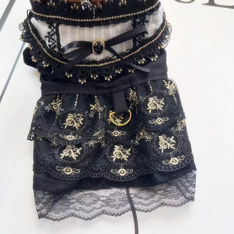 Gold Gothic princess style dress for a small dog or cat on a hanger