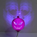 Pumpkin shaped lamp with purple or yellow light option, USB charging, 22cm tall Halloween decoration