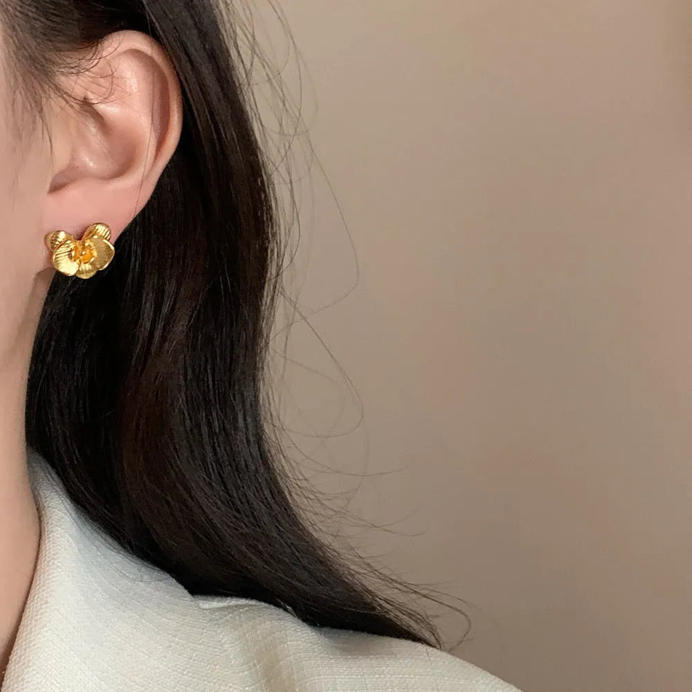 Retro flower earrings for women in gold or silver electroplated copper with petal detailing