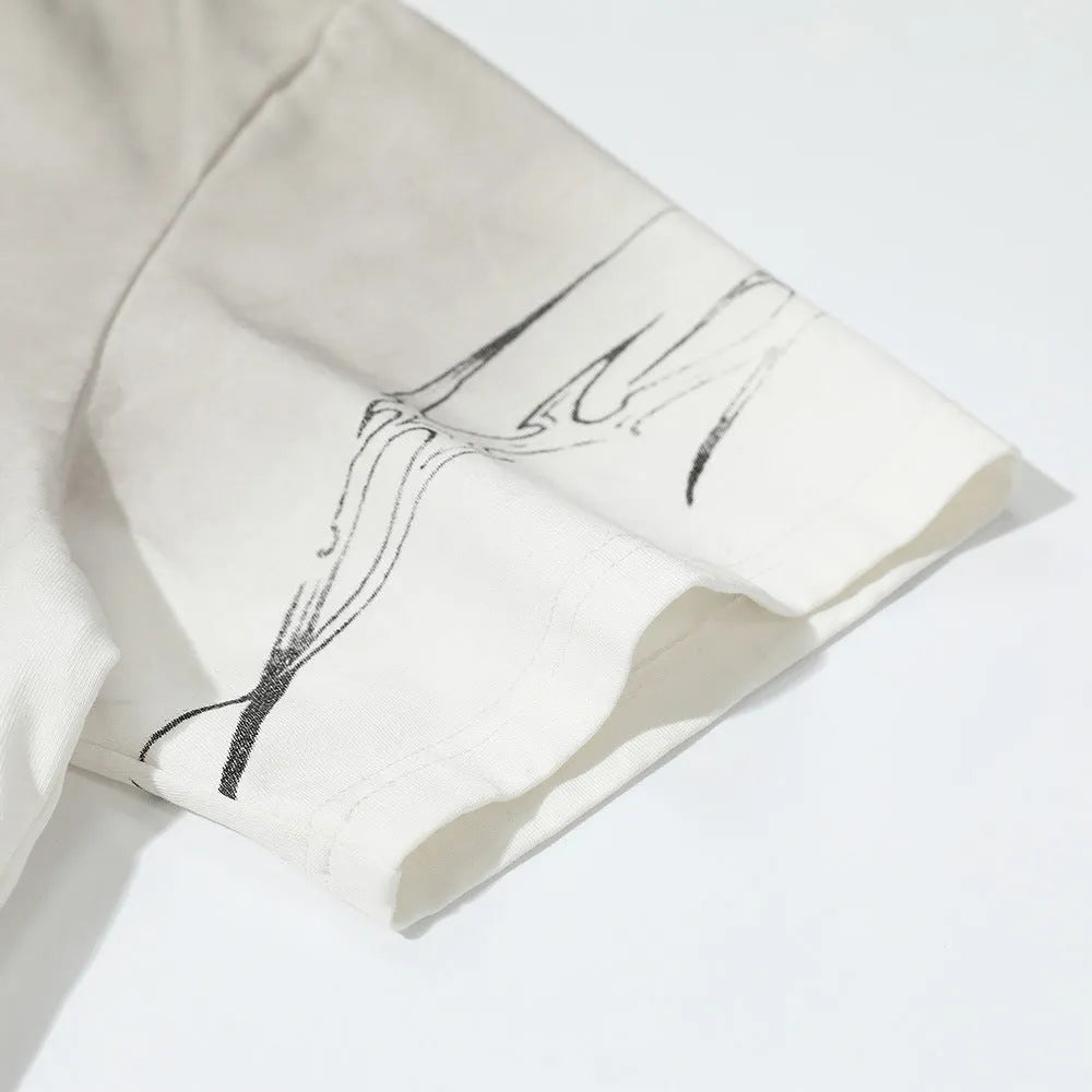 Men's black and white pure cotton short-sleeved printed t-shirt on a hanger.