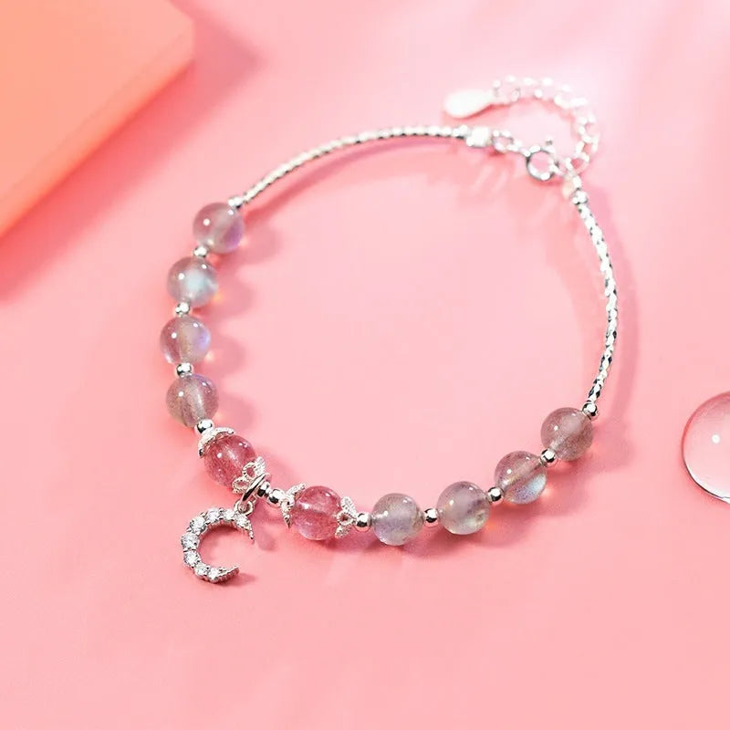 Handmade natural moonstone bracelet with crescent moon charm on adjustable chain