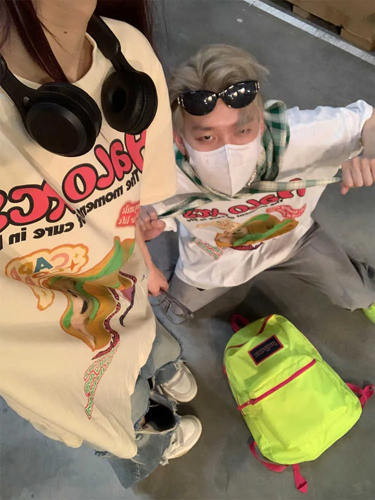 Cartoon hamburger dog printed loose fit T-shirt in apricot, sky blue, or white.