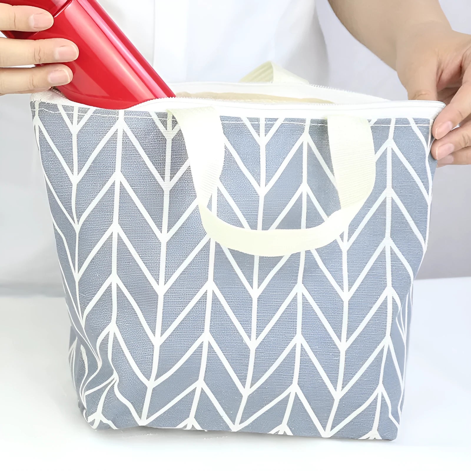 Arrow pattern polyester makeup bag for cosmetic and brush storage.