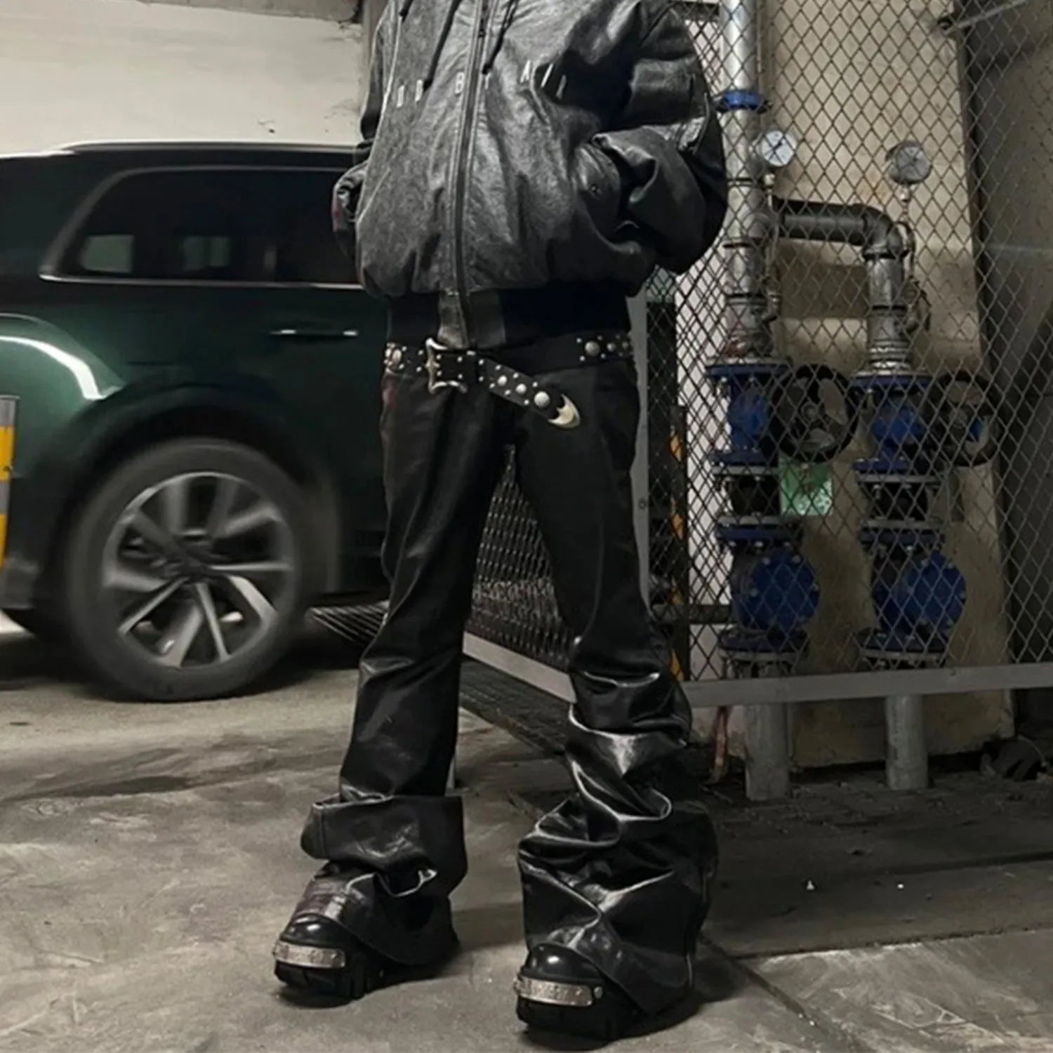 Black coated shiny patent leather skinny jeans with straight-leg mid-waist design
