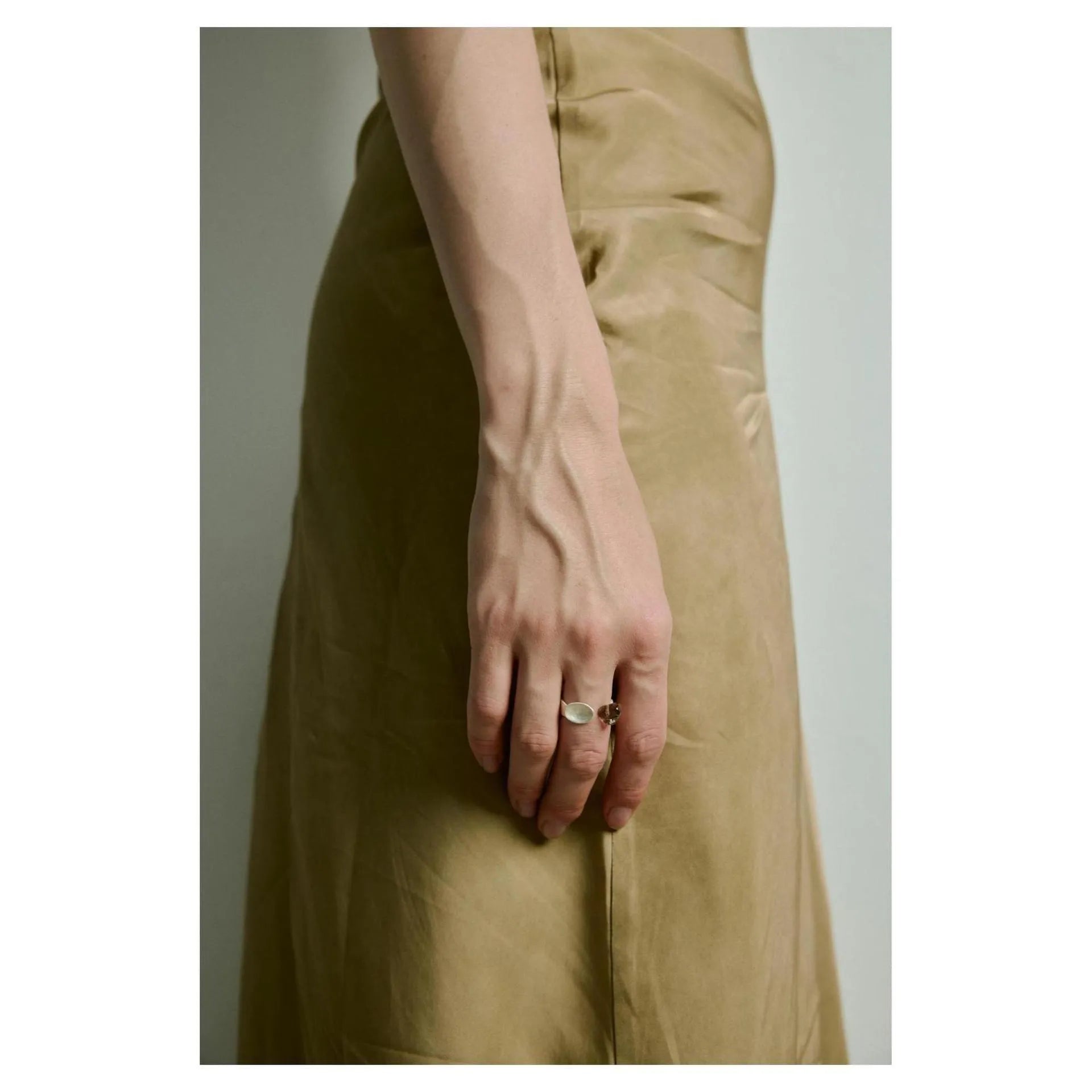 Alloy diamond shape electroplated ring and bracelet set on display