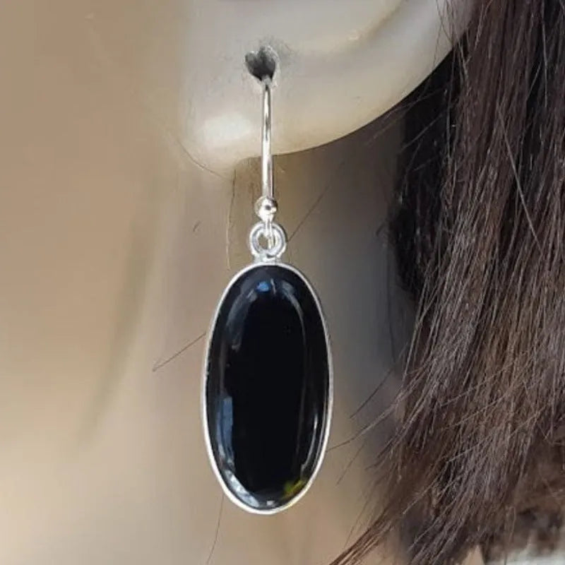 Women's geometric earrings with oval black agate pendants on silver-coloured alloy