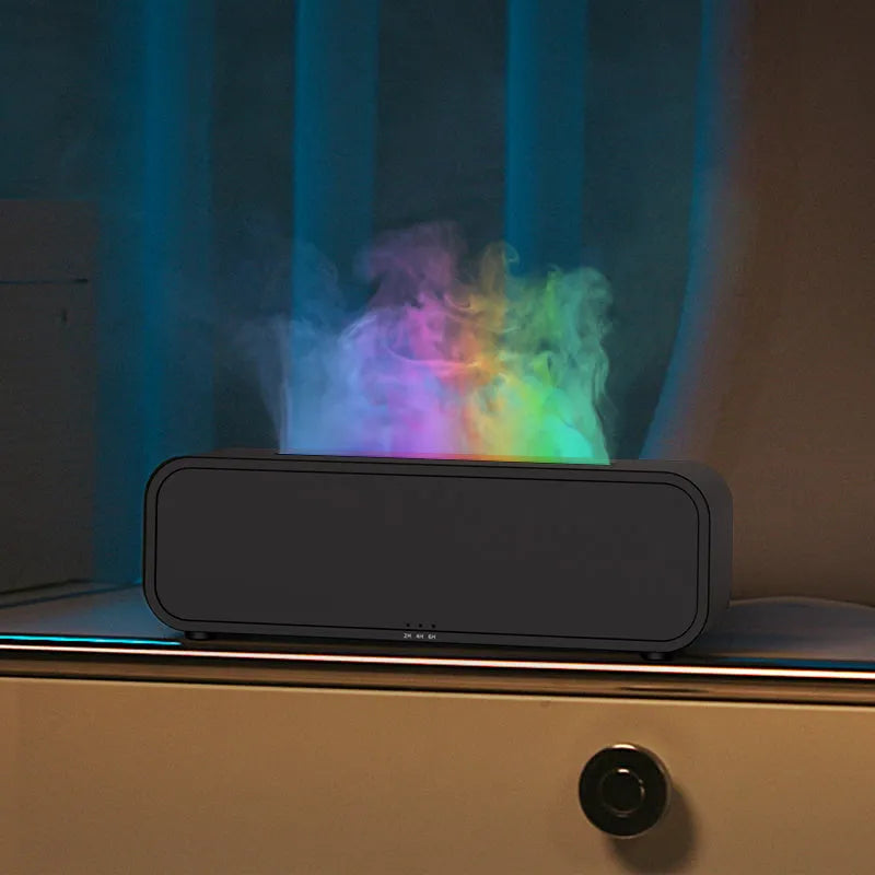 Black and white aroma diffuser with flame effect and colour-changing lights showing remote control