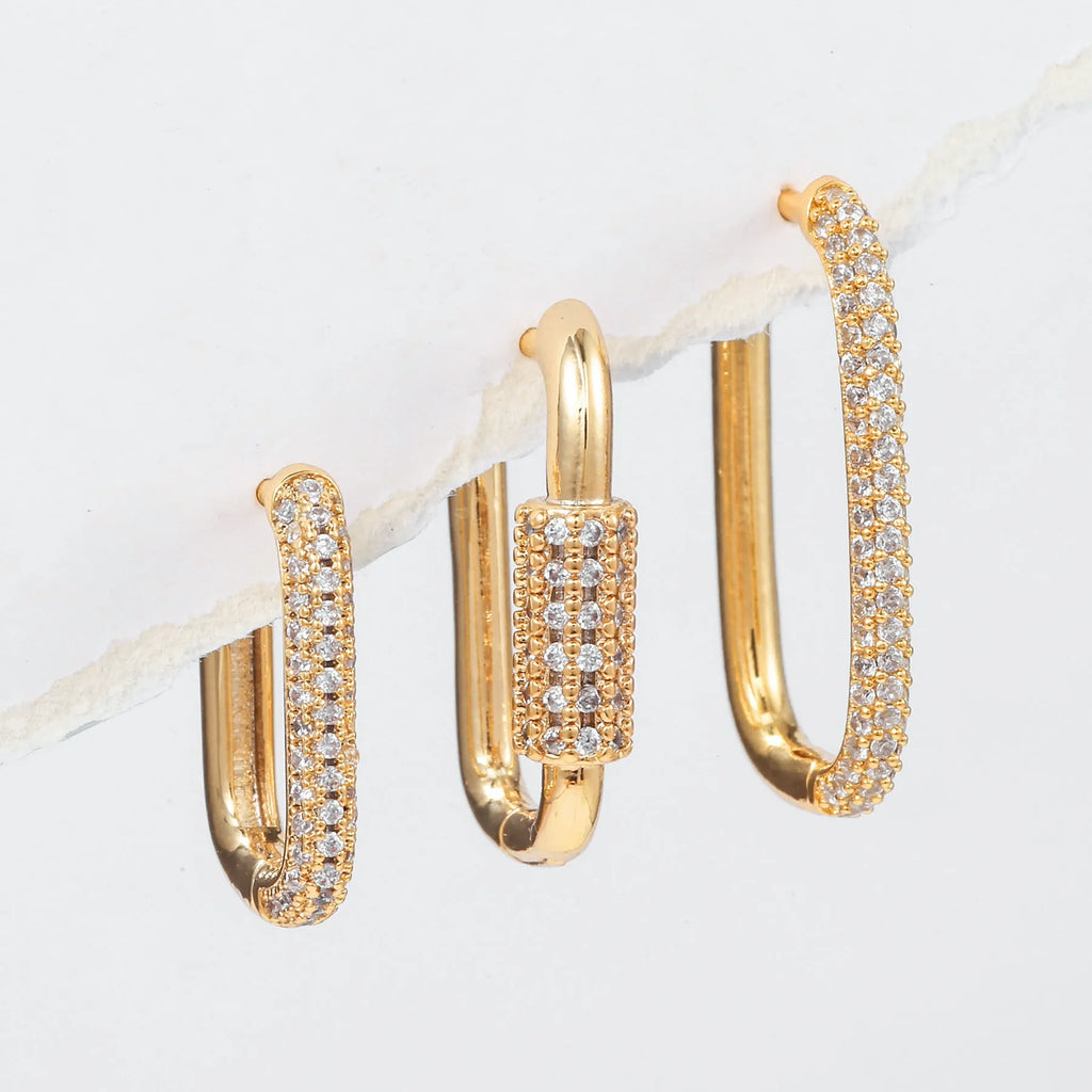Three geometric earrings with micro inlaid zircon on square clips in gold and white finishes