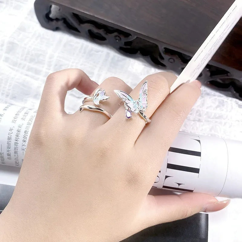 Copper insect-shaped adjustable ring with an irregular dripping oil finish.