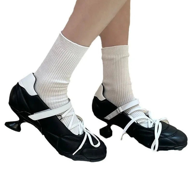Women's silver lace-up sports shoes with creative bow detail on front, round toe and mid heel