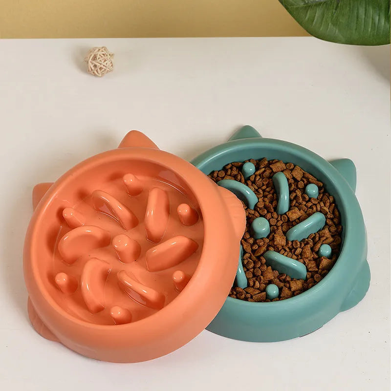 Green PP plastic slow feeder bowl for dogs with bone-shaped internal maze ridges.