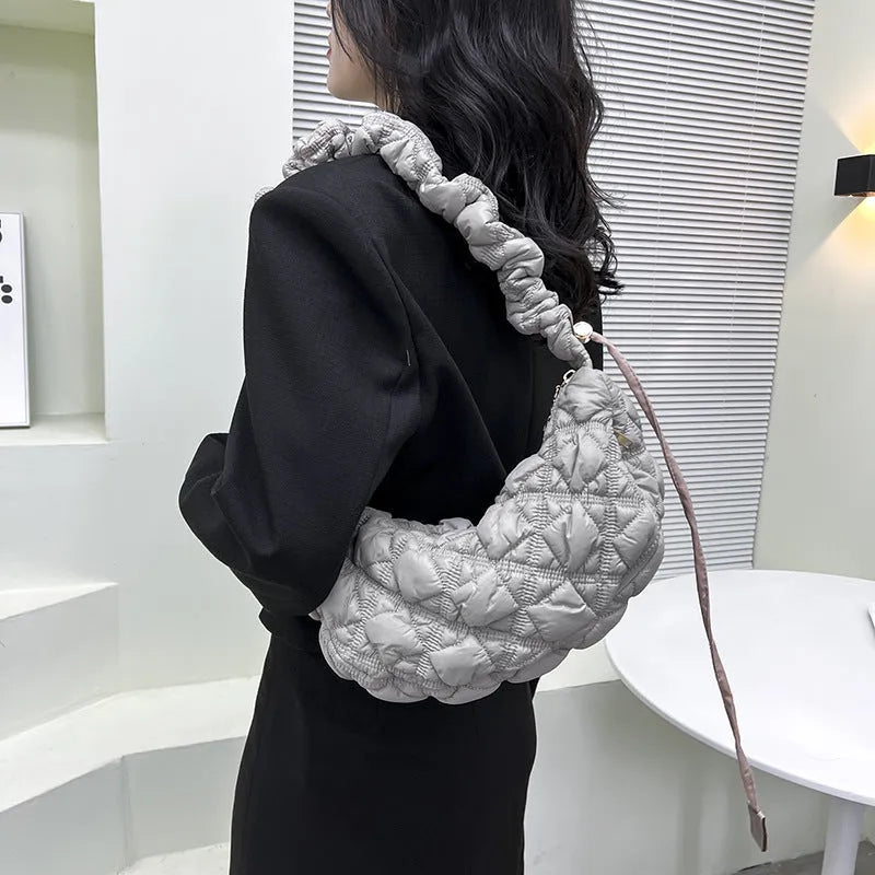 Women's nylon cloud underarm bag in beige colour with adjustable shoulder strap