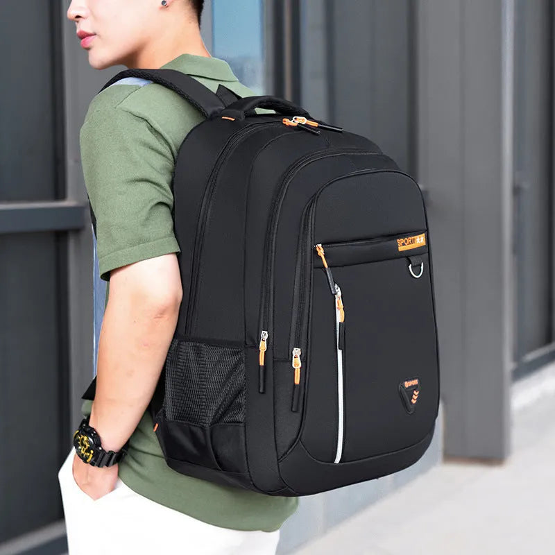 Men's Oxford cloth schoolbag in multiple colours showing large capacity and air pillow belt design