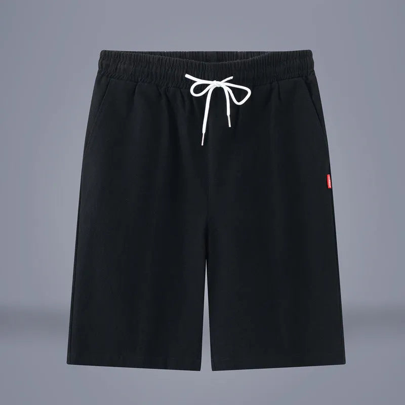 Solid colour cotton-linen cropped pants with a drawstring waist, shown in Army Green.