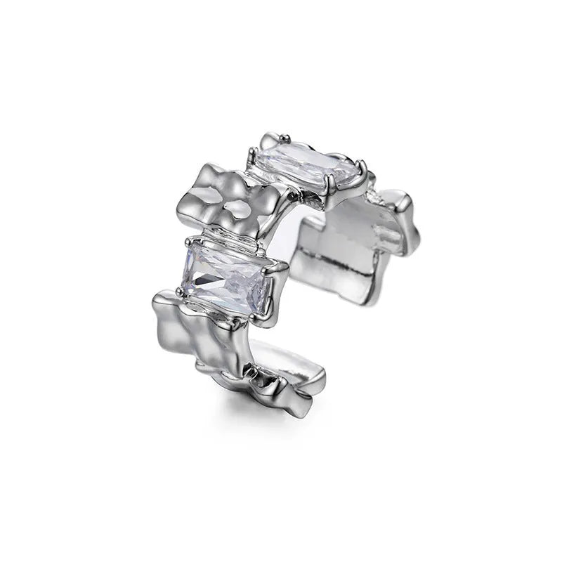Silver geometric cross ring with open zircon stone setting and retro design
