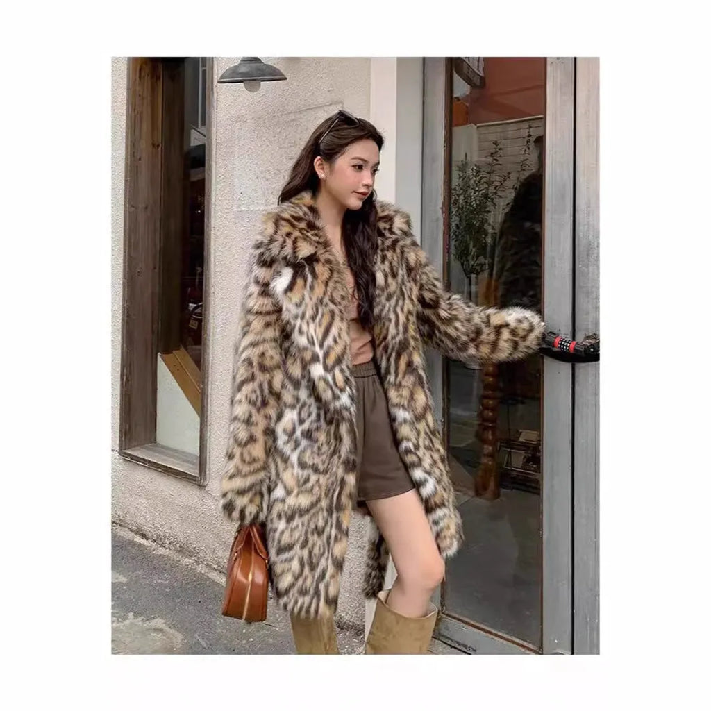 Women's faux fur coat with fox fur collar in street fashion style showing pockets and regular sleeves