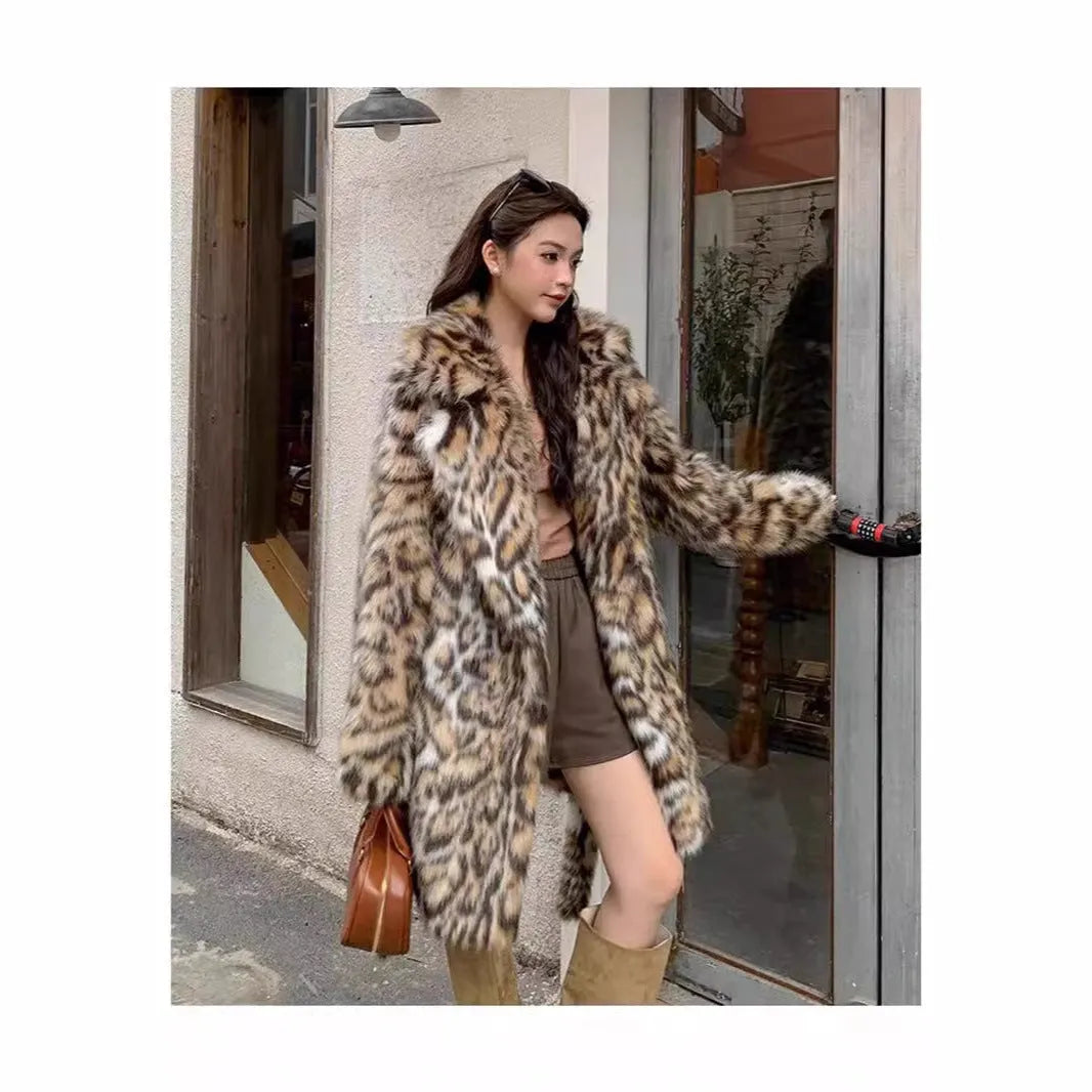 Women's faux fur coat with fox fur collar in street fashion style showing pockets and regular sleeves