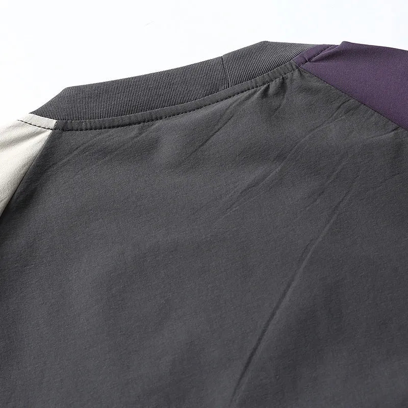 Dark grey men's t-shirt with contrast colour raglan sleeves and loose fit