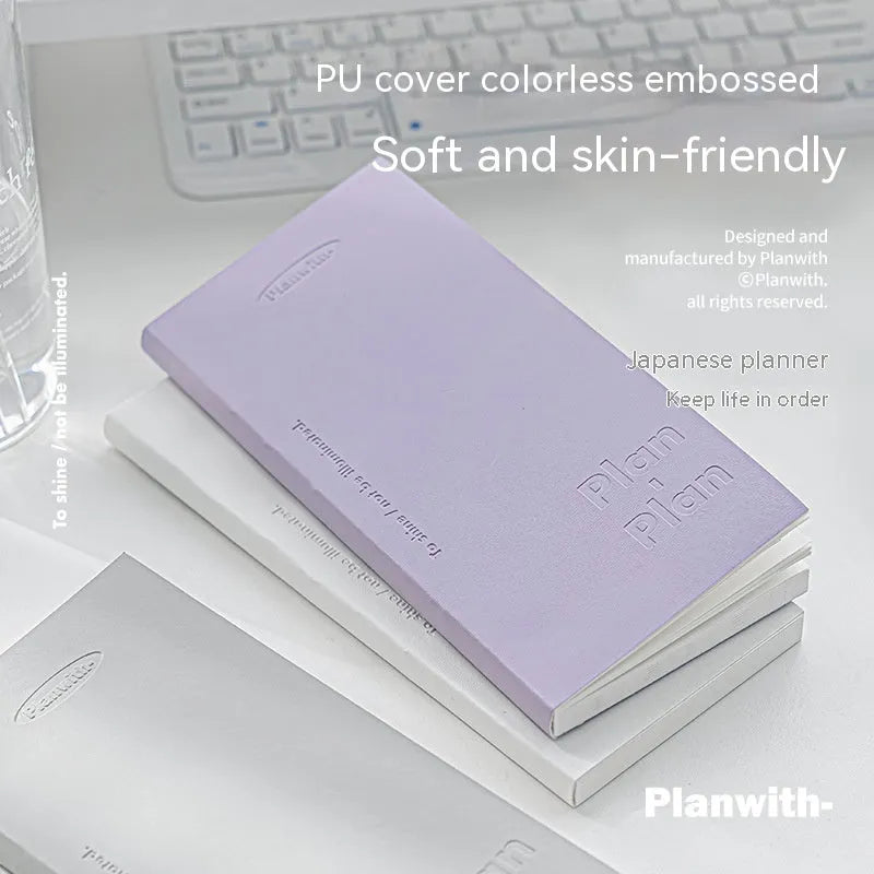 A5 embossed simple design meter book notebook with a paper cover.