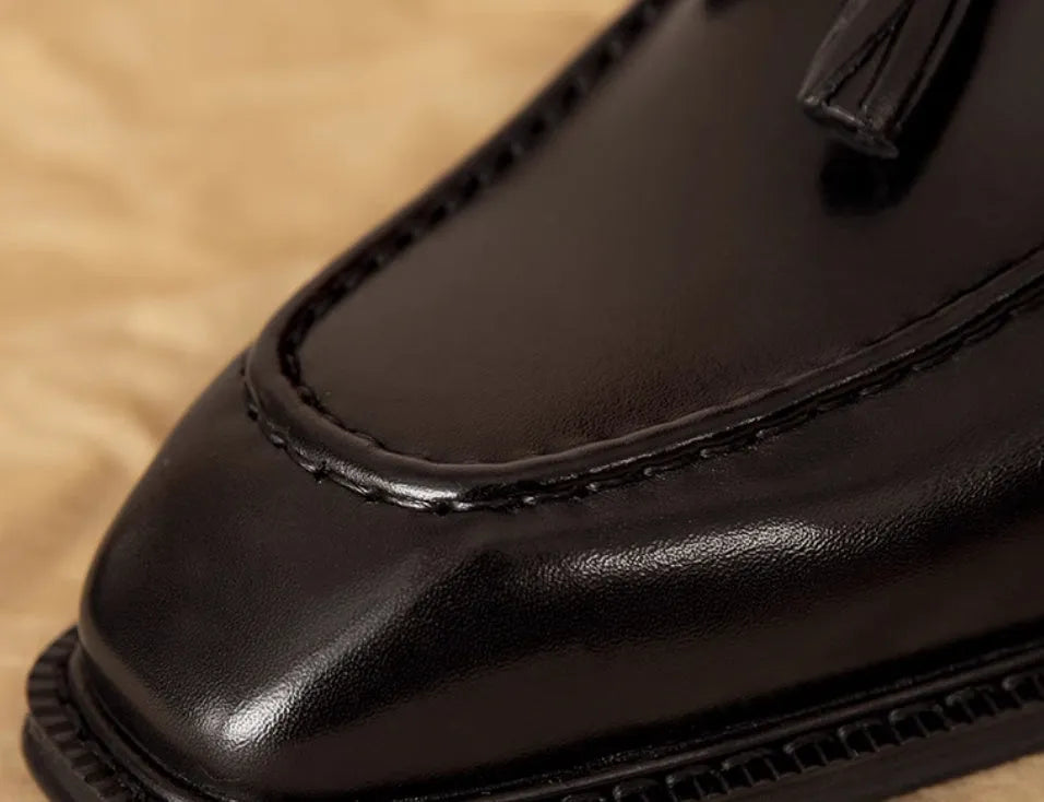 Men's black genuine leather slip-on loafers with rubber sole and British style design